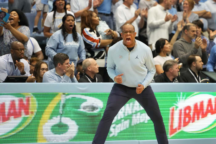 UNC basketball head coach Hubert Davis versus Duke